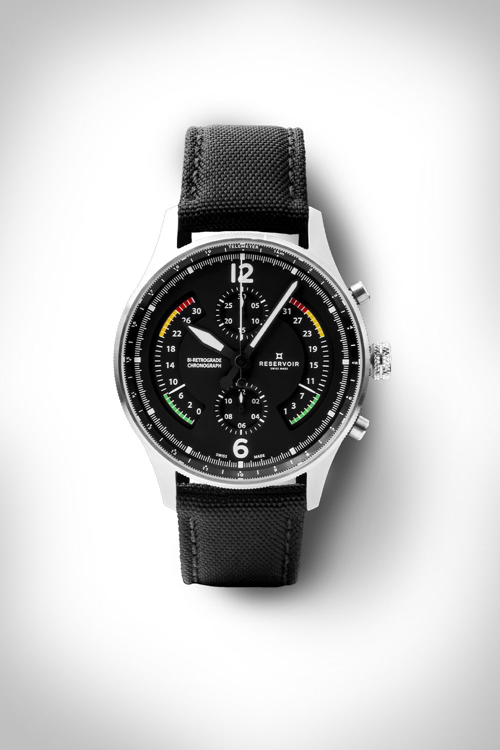 Black wristwatch with a fabric strap, silver case, and colored accents on the dial and sub-dials.