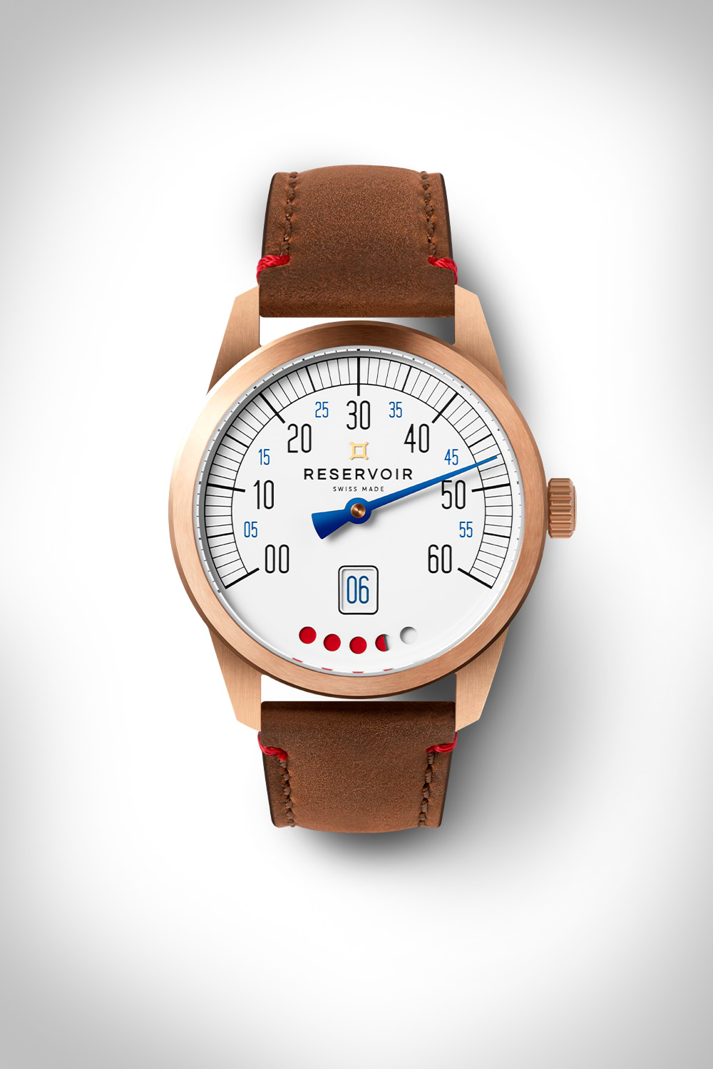 A wristwatch with a copper case, brown leather strap, white dial, and blue minute hand, brand Reservoir.
