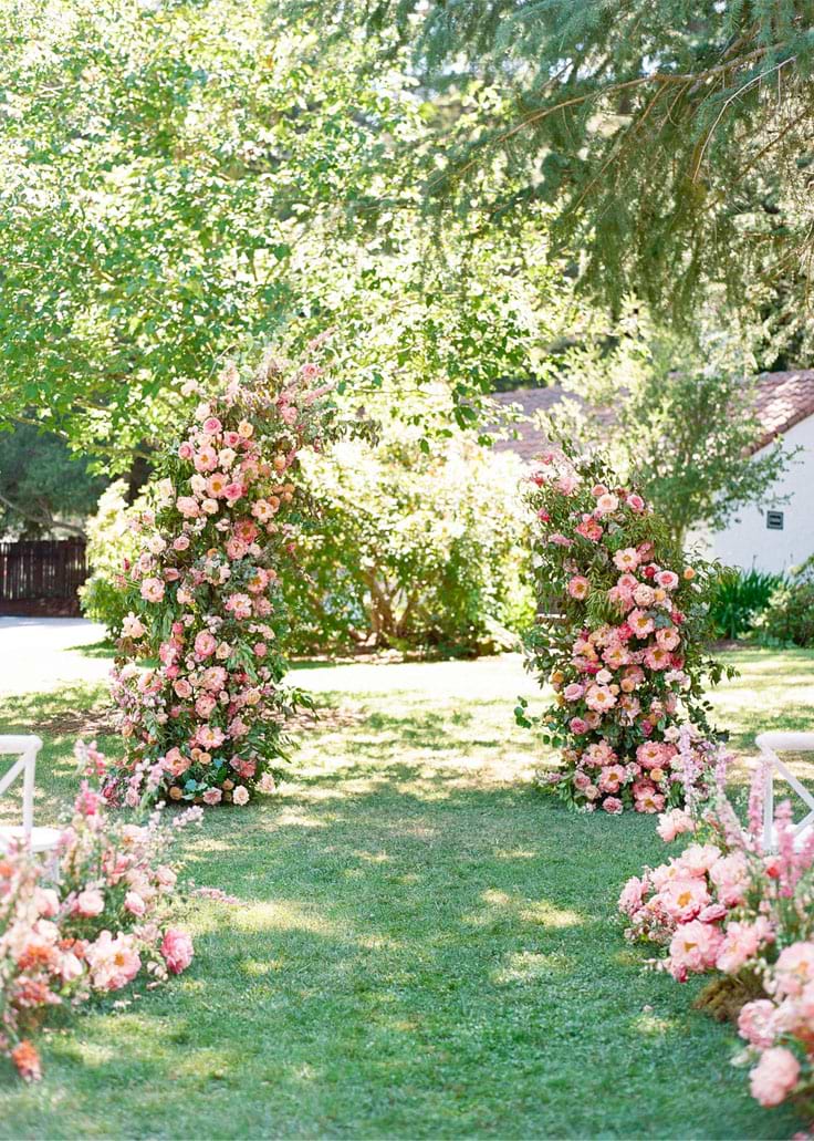 Broken floral arch the center of the ceremony 