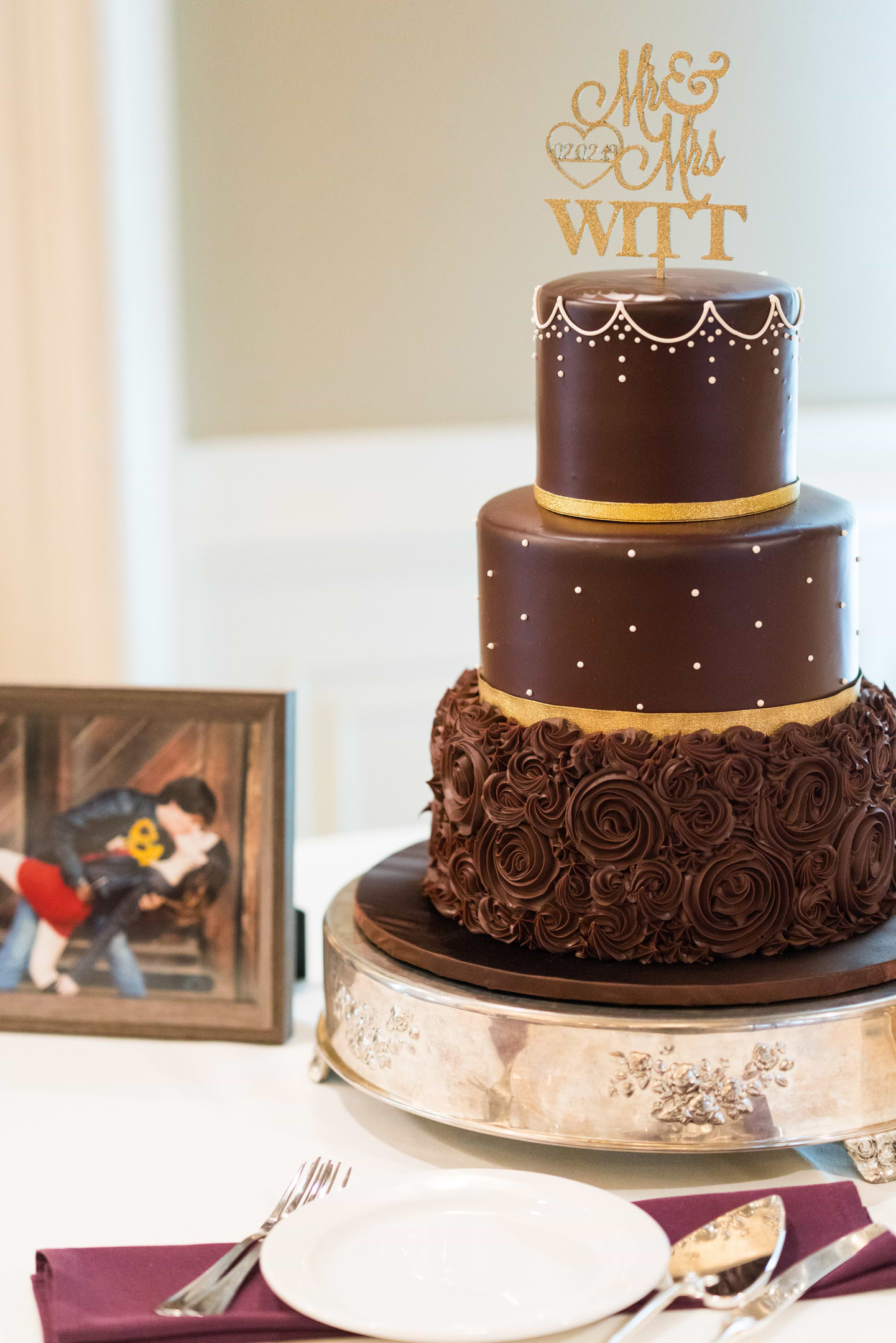 Three-tier chocolate ganache wedding cake