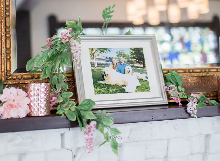 Julie & Vince's family portraits have pride of place on the mantel at Sequoia Mansion, CA
