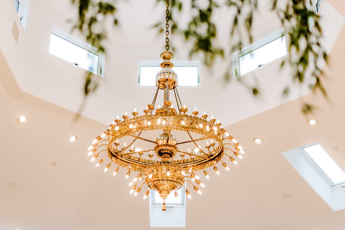 The grand chandelier at Granite Rose is originally from the Ritz Carlton Paris