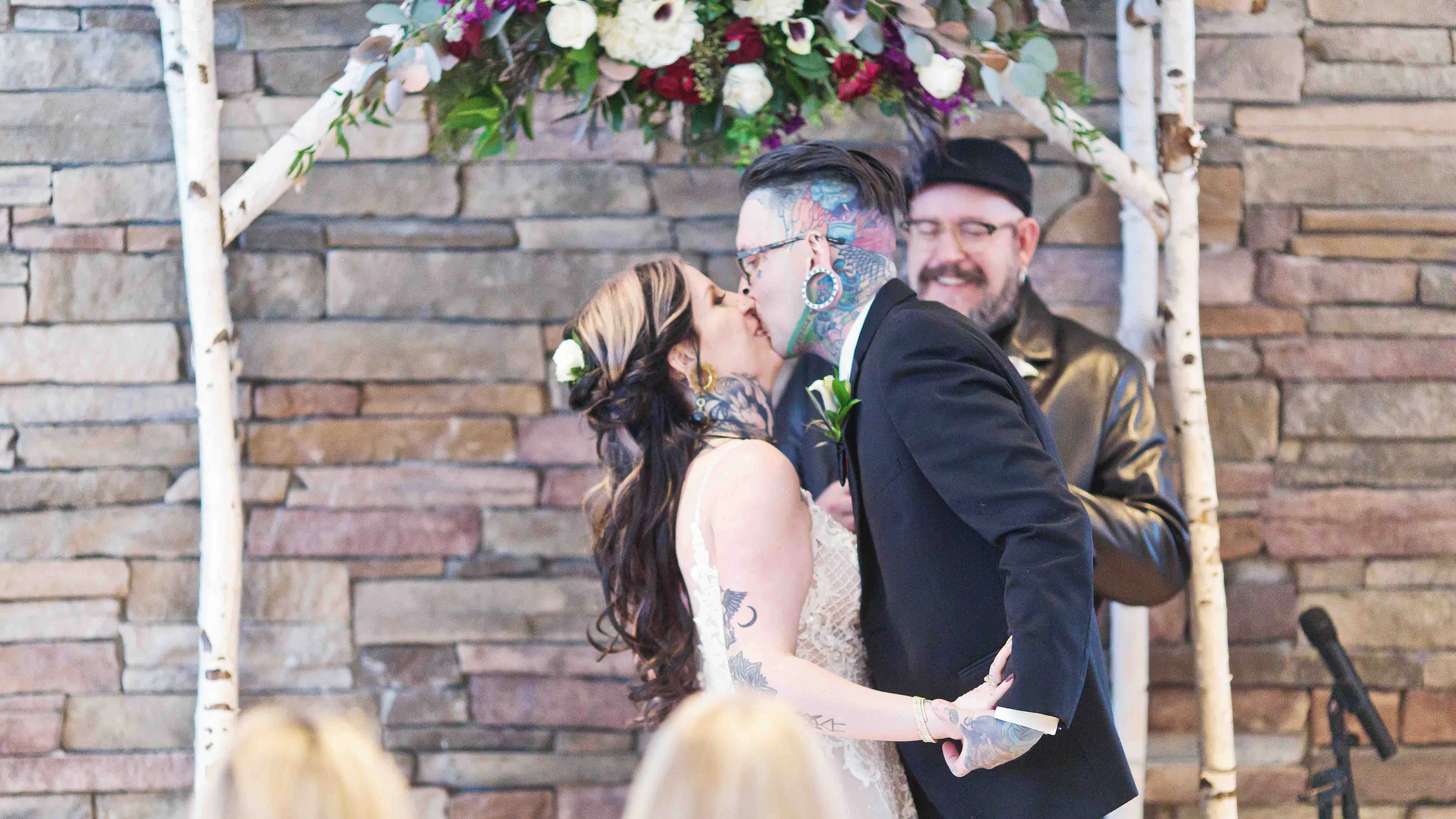 Romantic First Kiss at Boulder Creek Winter Wedding