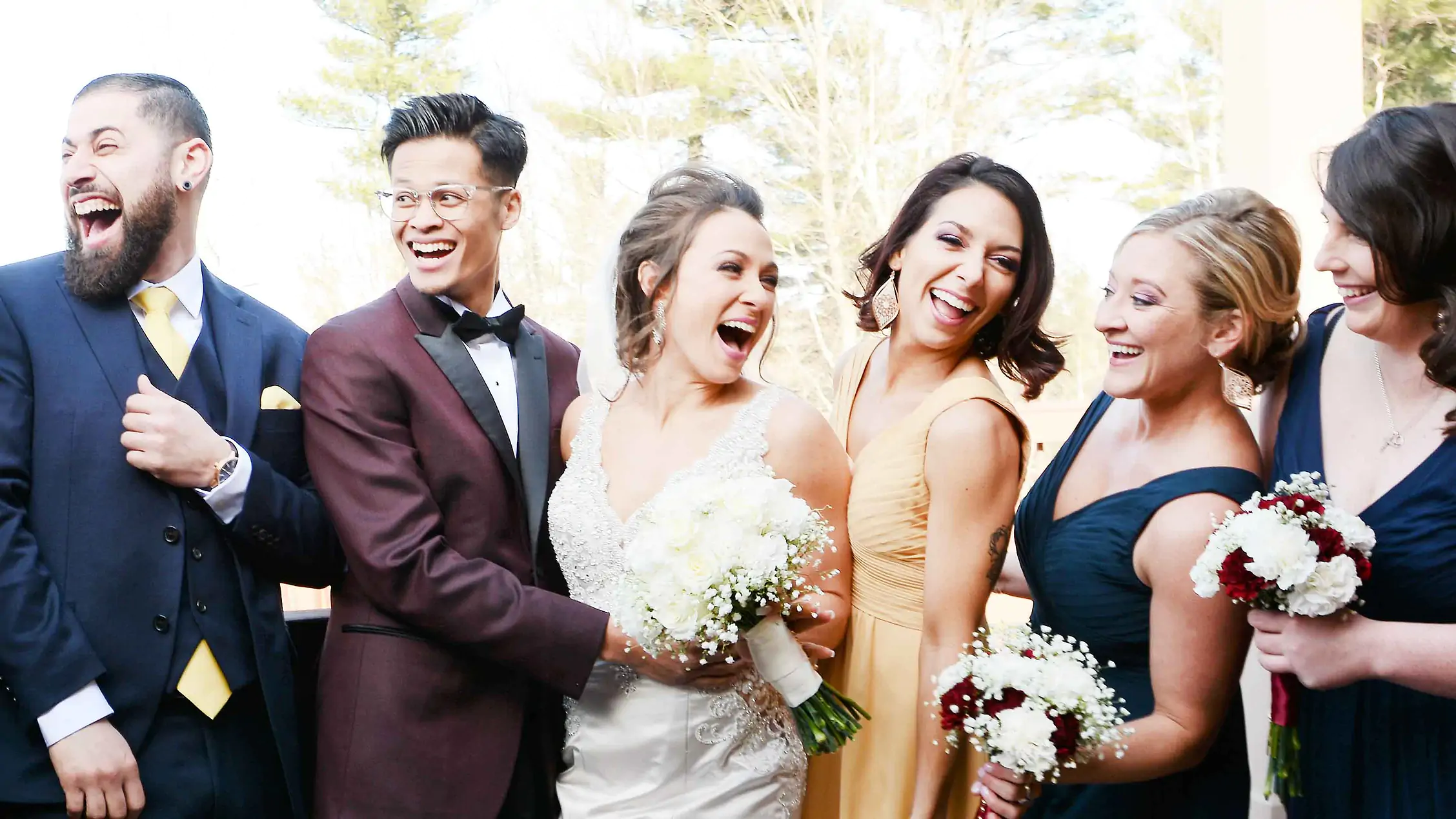 JULIA AND JESSE ARE ALL SMILES WITH THEIR BRIDAL PARTY