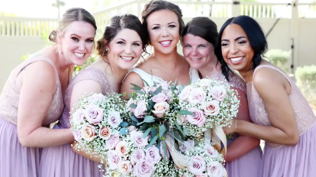 Kari and her beautiful bridesmaids in matching lavender dresses