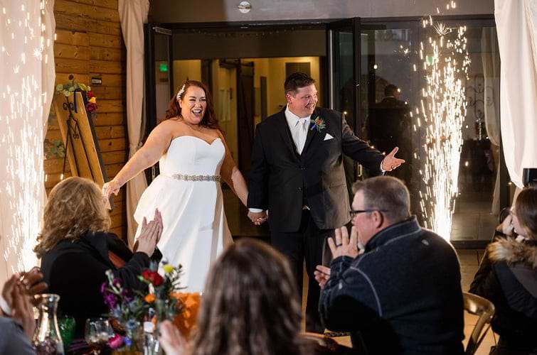 Couple doing grand entrance with grand sparkler moment - Boulder Creek by Wedgewood Weddings