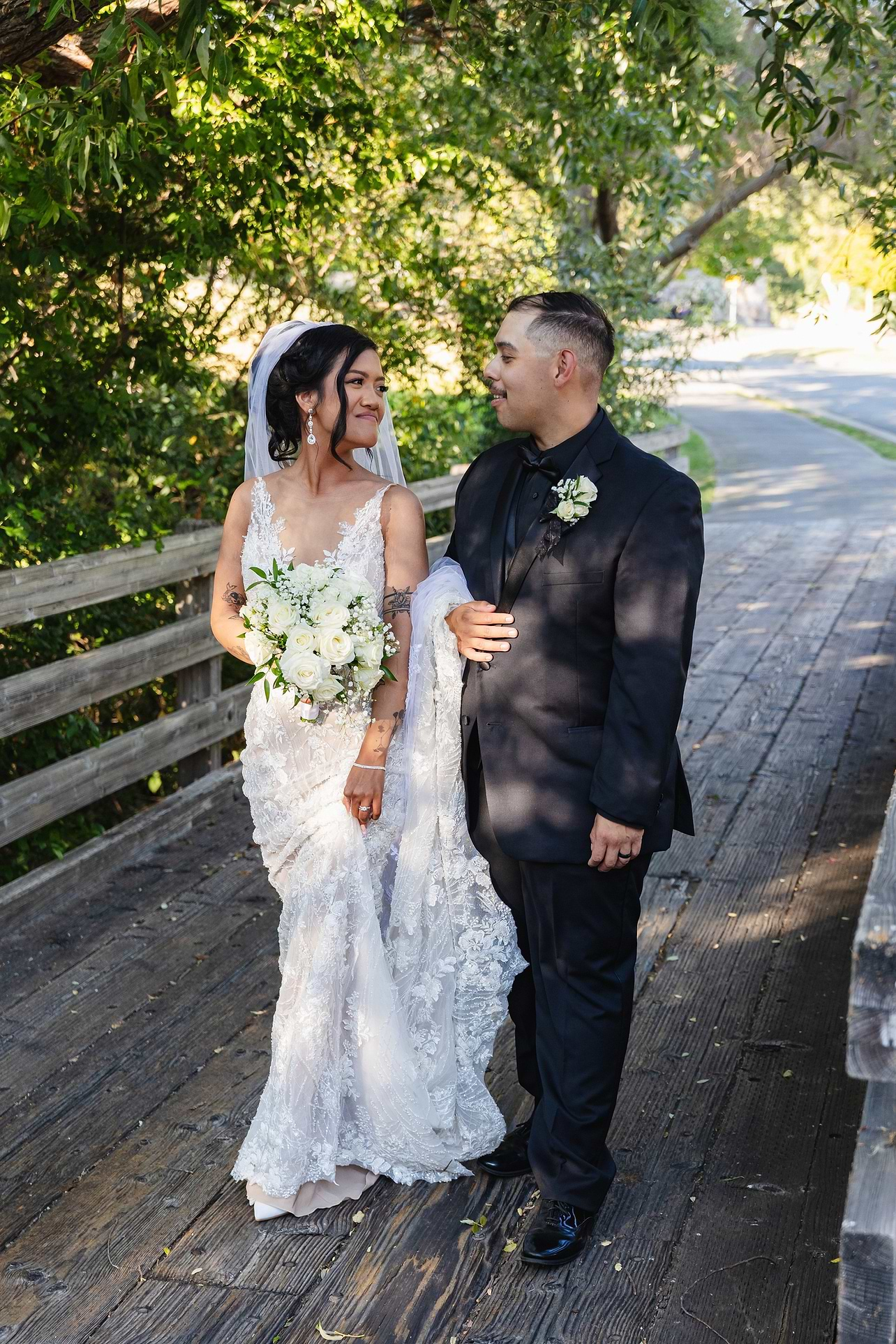 Couple on bridge at Hiddenbrooke Hills by Wedgewood Weddings