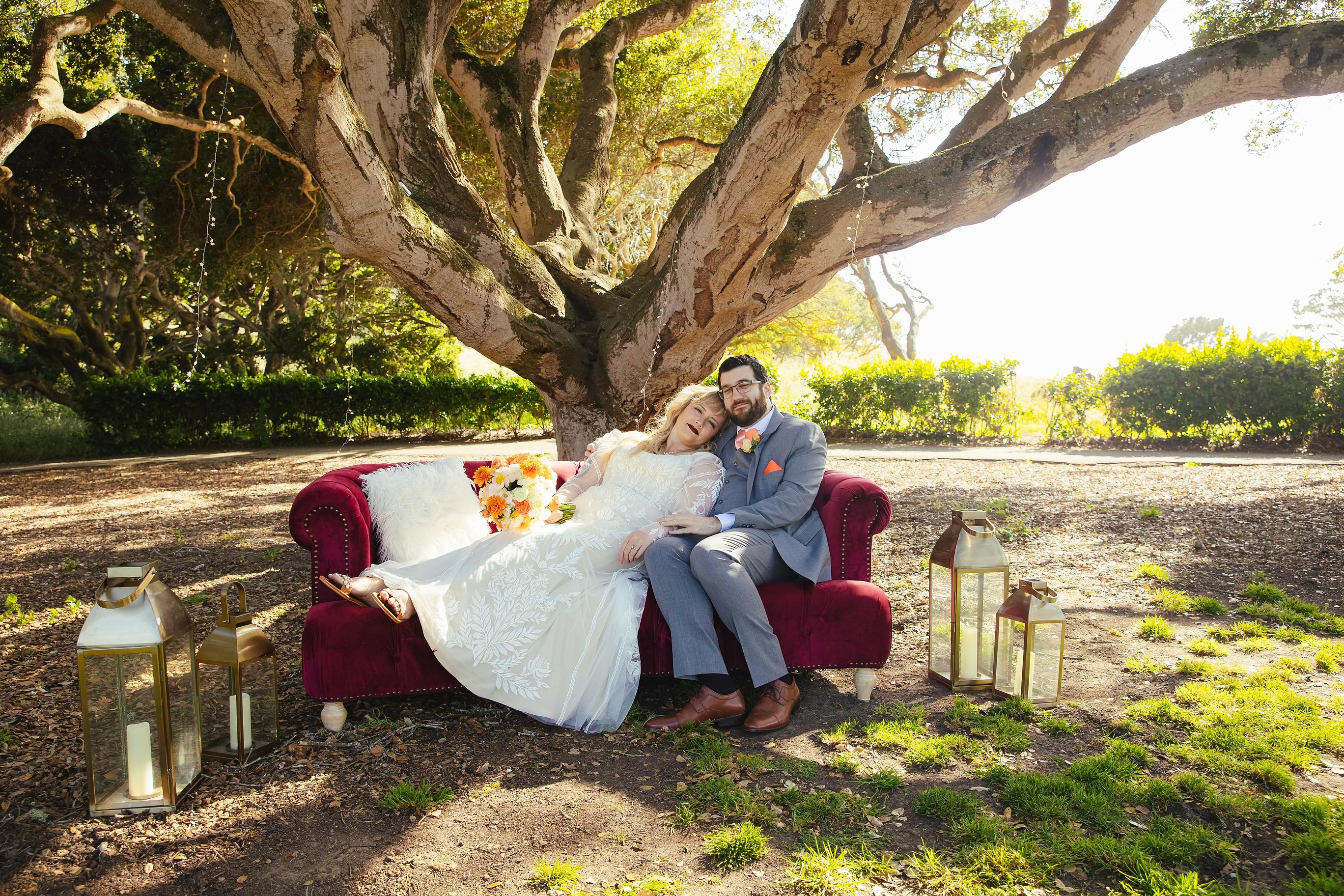 Couple posing on lounge furniture - Carmel Fields by Wedgewood Weddings