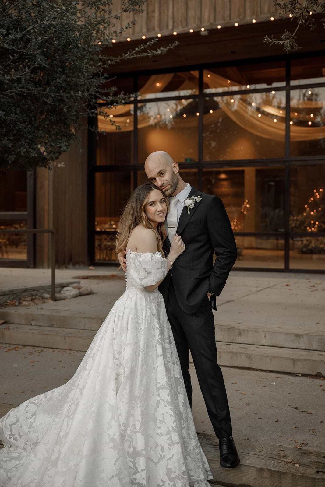 Newlyweds outside Carriage House at Galway Downs by Wedgewood Weddings