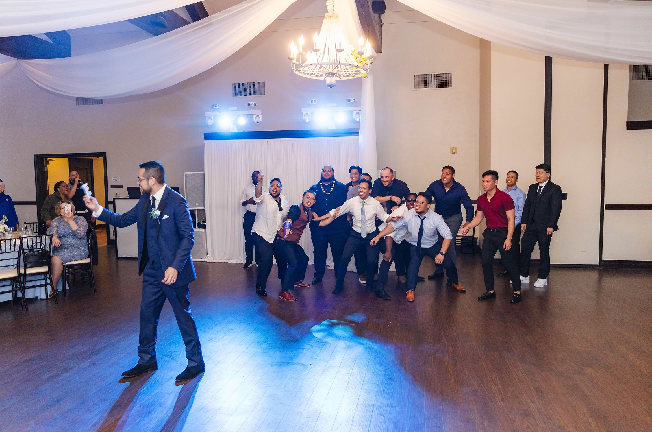 Start of the Garter Toss at Stonetree Estate by Wedgewood Weddings