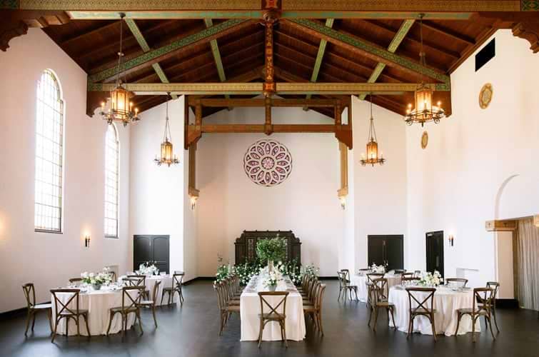 Fillmore Chapel features vintage ornate wood beams, vaulted ceilings, and beautiful hardwood floors