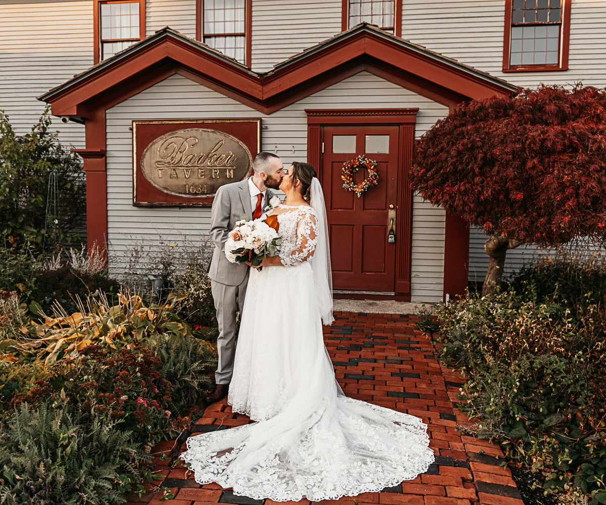 Couple in front of historic Barker House by Wedgewood Weddings