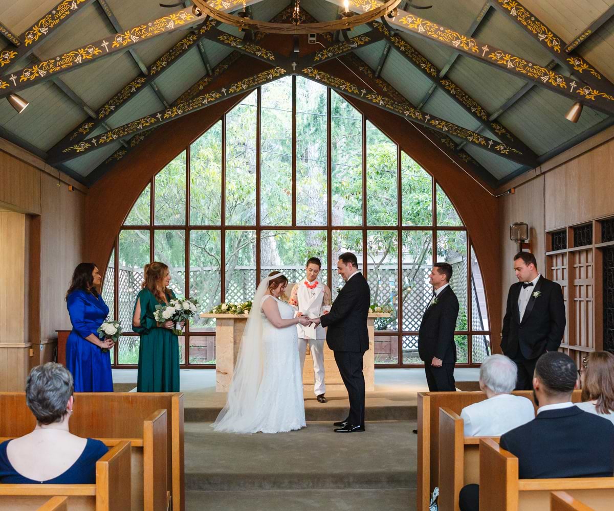 Bride reading wedding vows during ceremony - Chapel of Our Lady at the Presidio - Wedgewood Weddings - 1