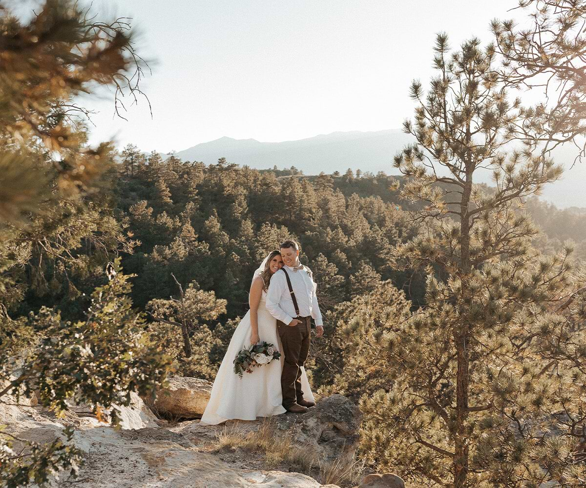 Couple with stunning mountain views -Creekside Terrace by Wedgewood Weddings