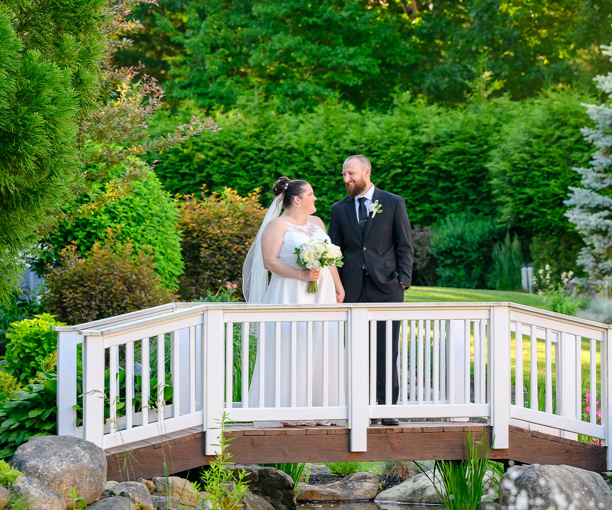 Couple on bridge - Miraval Gardens by Wedgewood Weddings