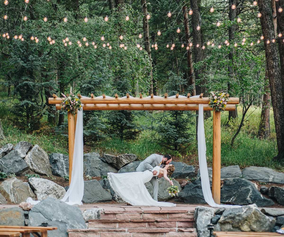 Bride and groom at outdoor ceremony, The Pines by Wedgewood Weddings