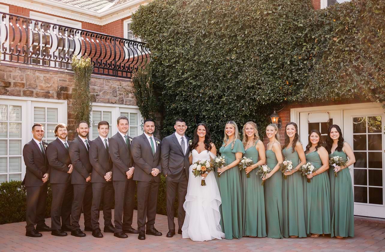 Mitch and Raelyn with their wedding party at Stonebridge Manor