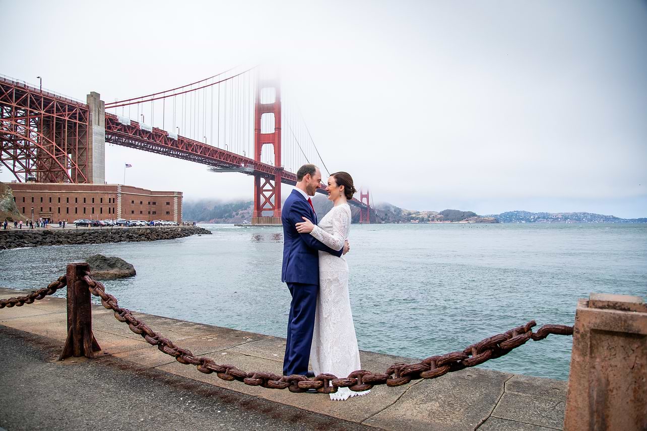 Rebecca and Mike in front of the Golden Gate Bridge - Log Cabin Wedding