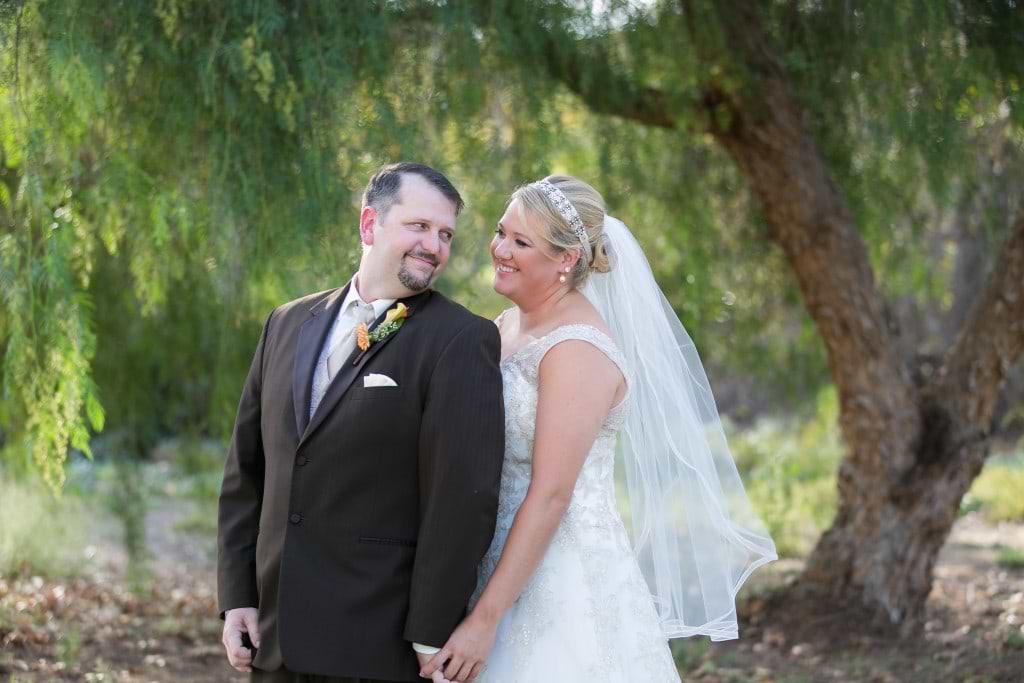 Eric and Nicole share a smile on their wedding day at Fallbrook Estate