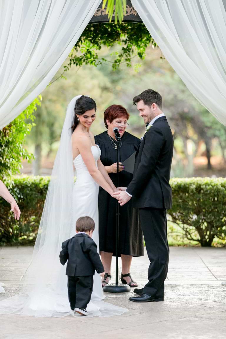 bride and groom with ring bearer
