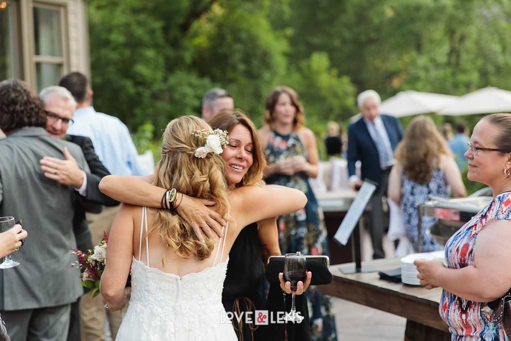 bride hugging loved ones