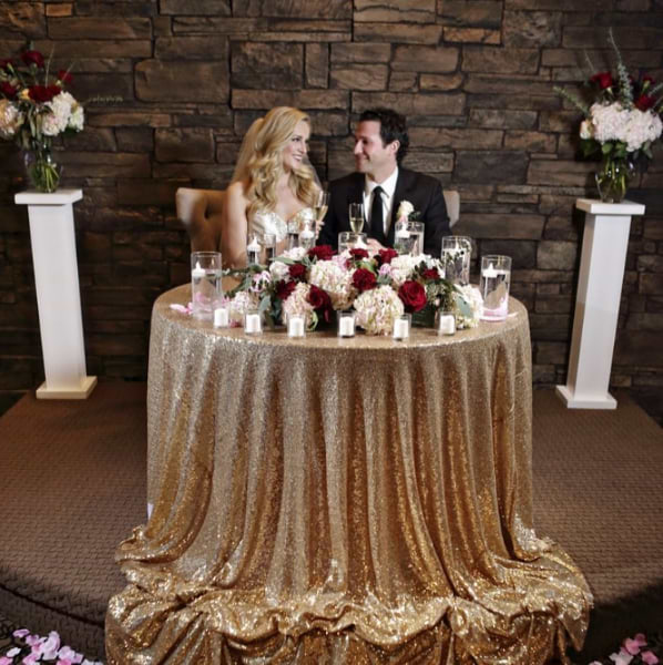 gorgeous couple wedding reception table