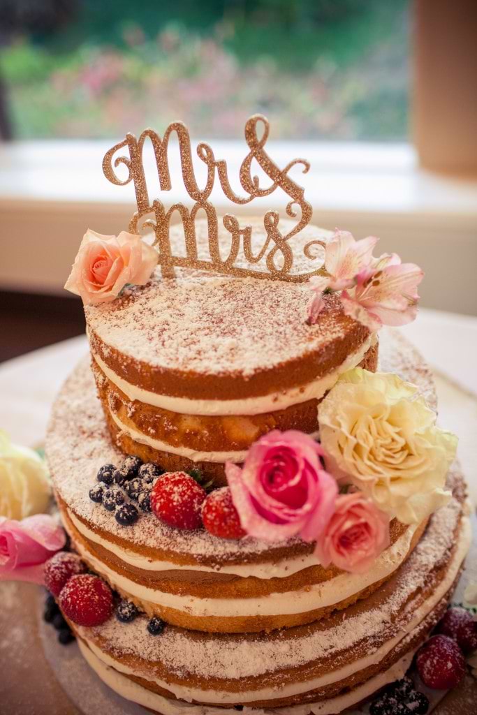 gorgeous naked wedding cake with sparkle cake topper