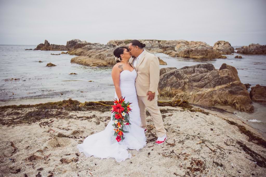 bride and groom kiss beach wedding - Wedgewood Weddings