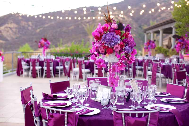purple wedding chair decor and floral bouquet at The Retreat by Wedgewood Weddings