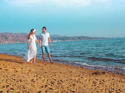 A loving couple on the beach in Tel Aviv