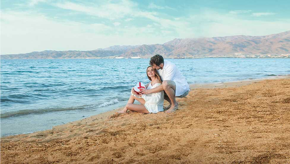 A loving couple on the beach in Tel Aviv