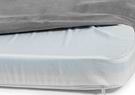  a close up of a grey snooz pad with the outer cover partially removed 