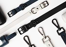 Numerous Diggs Leashes in Ash (off white), Navy (dark blue), Charcoal (midnight black) and Dispensers.