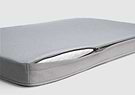  A close up of a dog bed on a white background 