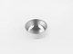  a white metal bowl sitting on a white surface 