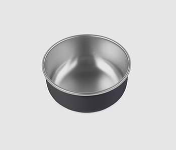  A black and silver bowl on a white background 