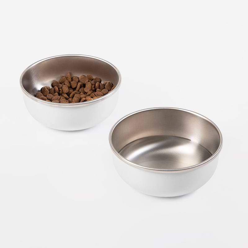 A 2 Ash Bowl, one is empty and the other one is with a dog foo.d