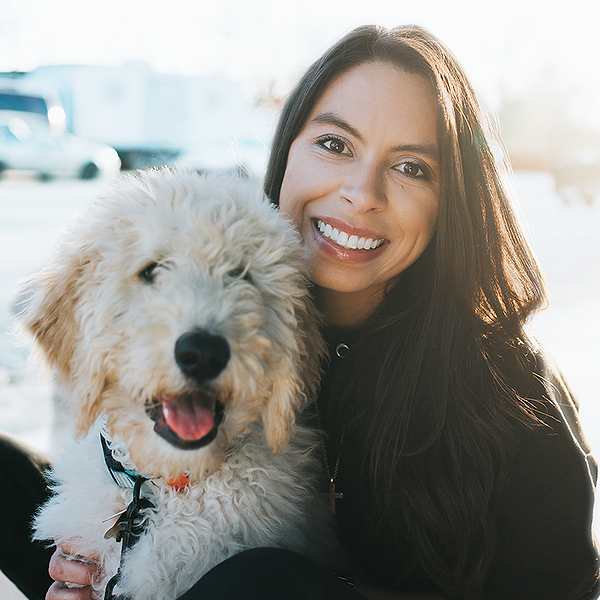 Rachel Fusaro YouTube a woman sitting on a bench with a dog