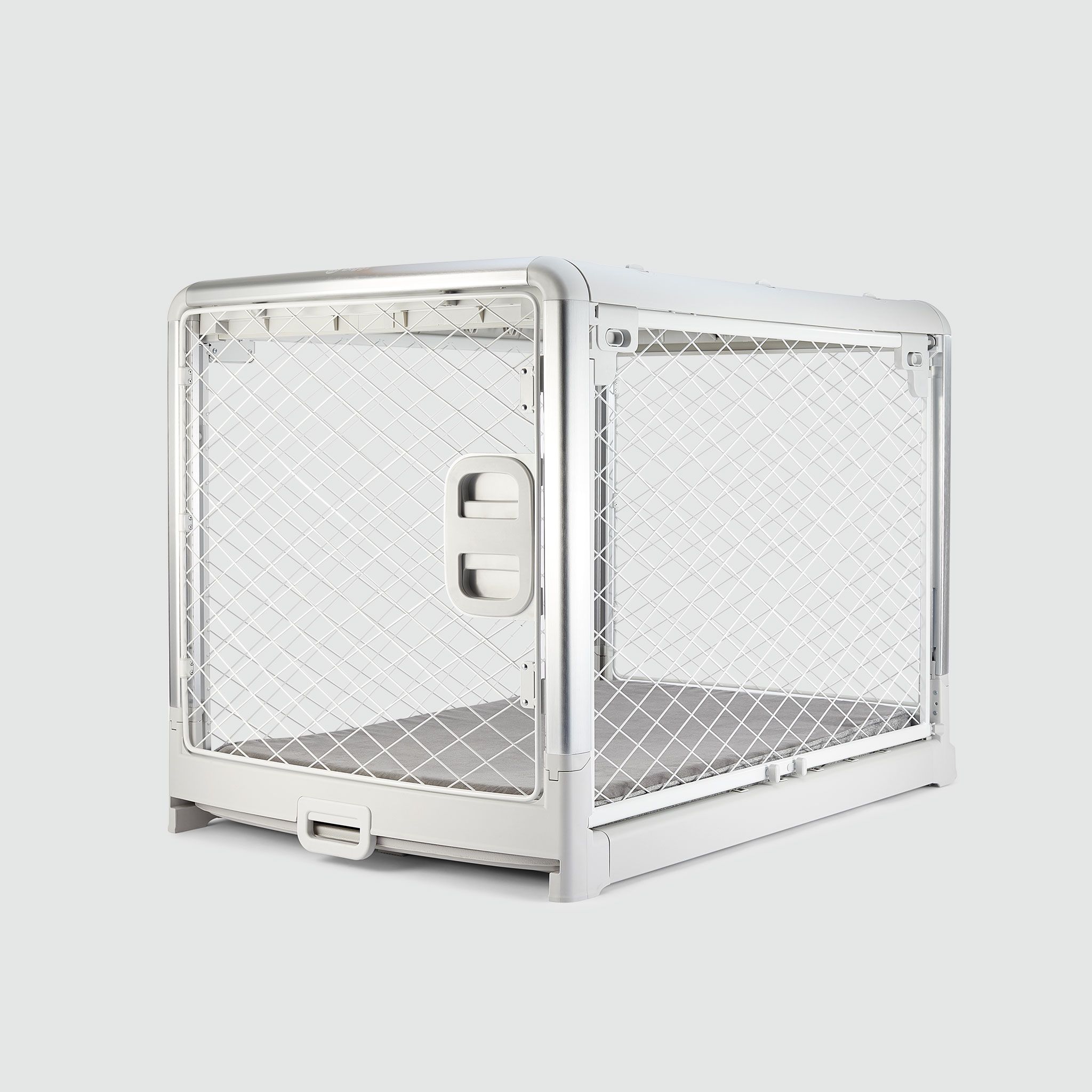  A white metal dog crate with open doors 