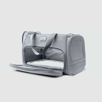 Passenger Grey Product A gray Passenger pet carrier bag is sitting on a white surface