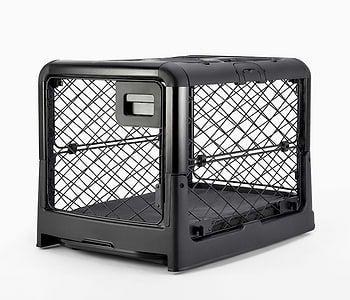  A small Diggs Revol crate in Charcoal (midnight black) color with a dark grey snooz pad inside.  