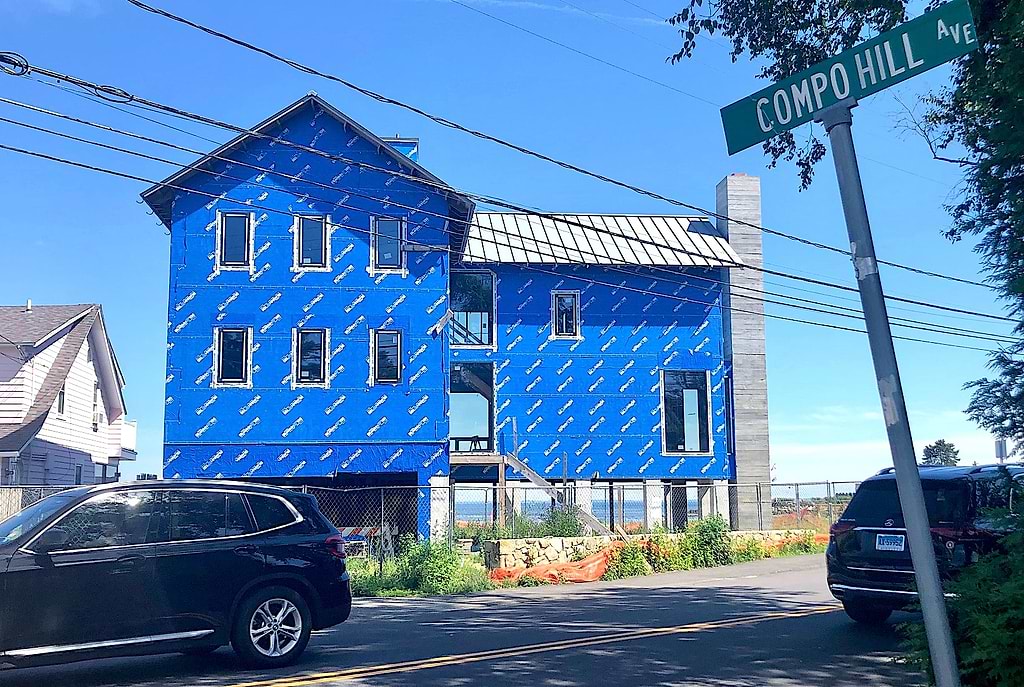 The 'blue house' at 233 Hillspoint Road was removed from the town's blighted properties list Thursday night. / Photo by Thane Grauel