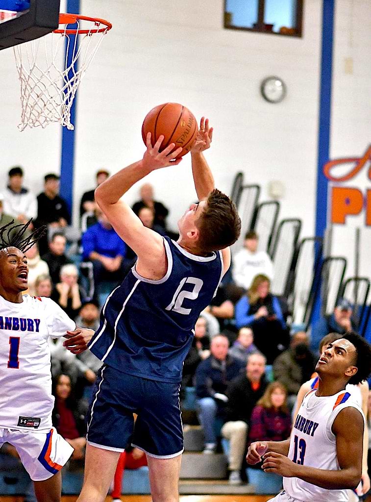 Staples boys basketball suffers first loss against Danbury