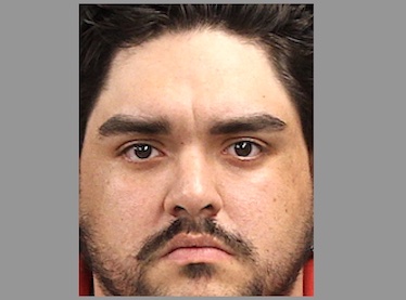 Police: Man pointed handgun at driver of another vehicle