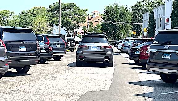 The Parker Harding parking lot is often full, even on weekday mornings. Several of those attending Wednesday’s Board of Selectwomen meeting said that’s because employees at nearby businesses and not shoppers park there before stores open.