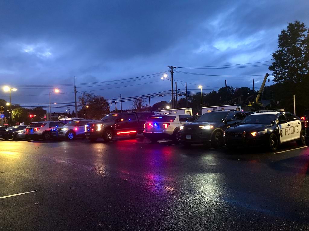Police vehicles getting ready to close down and shift lanes on I-95. / Photo by Thane Grauel