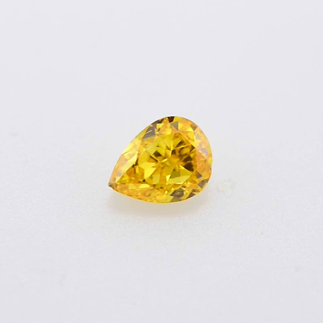 0.15 carat, Fancy Vivid Orange Yellow Diamond, Pear Shape, (SI2 ...