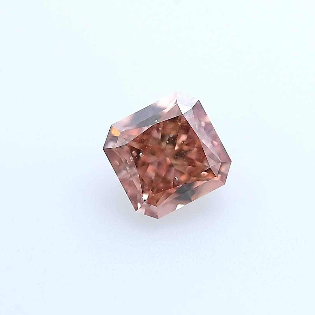 0.49 carat, Fancy Deep Orangy Pink Diamond, Radiant Shape, SI2 