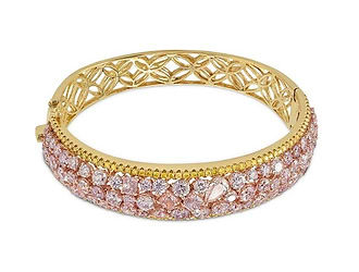 A fancy pink and fancy yellow diamond bangle