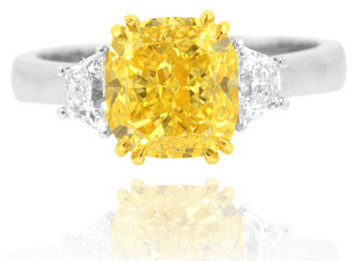 4.67 Carat, Fancy Intense Yellow Three Stone Ring with Trapezoid Diamonds, GIA